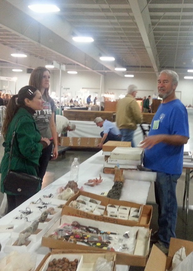 Bob selling minerals to some happy customers.