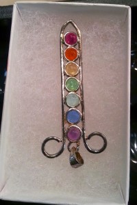 A rainbow crystal pendant for your chakras.