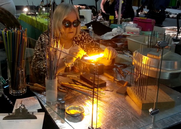 Making glass beads (lampwork) at the Three Trails Trading Post.