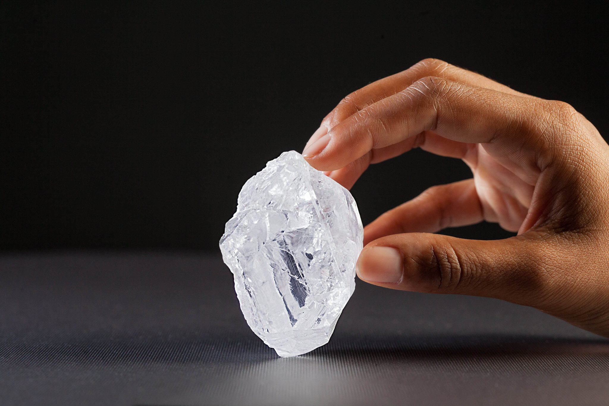 hand holding largest uncut diamond from Lucara
